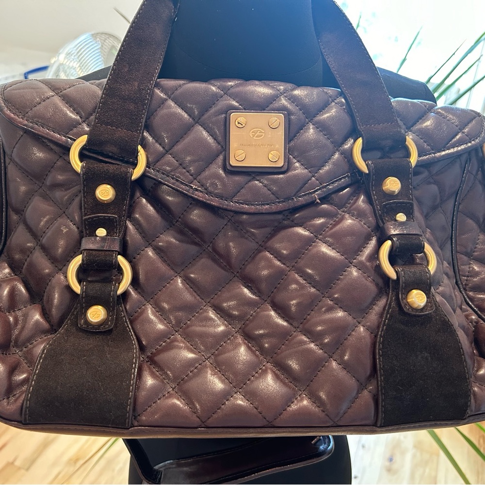 Francesco Biasia dark brown leather handbag with long shoulder strap.